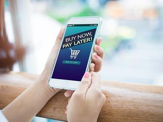 Woman with mobile displaying